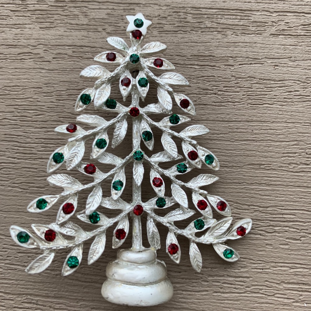 Silver tone Christmas tree pin with red and green “ornaments“.